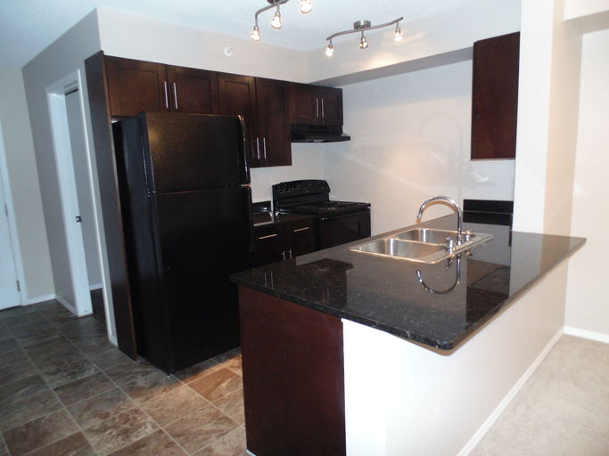 Photo of Taralake Place - Top Floor, 2 Bdrm, 2 Bath and Den with Htd Underground Parking Property Image