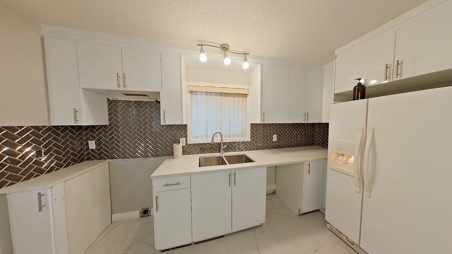 Photo of Renovated 4 Bed / 3 Bath Home in Millwoods with Double Garage Property Image