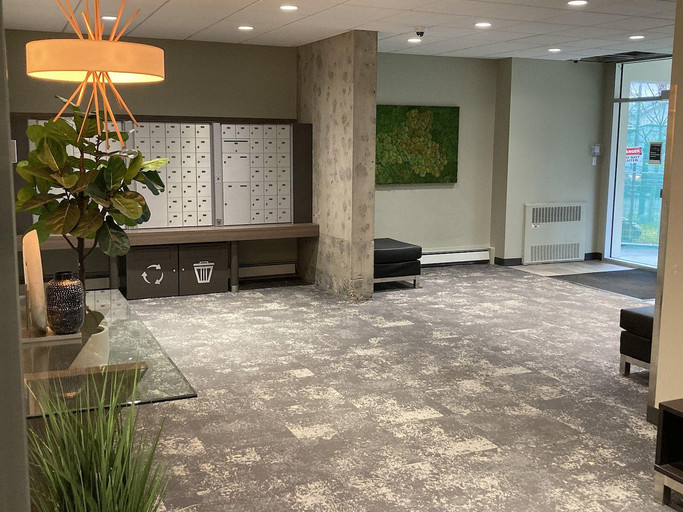 Photo of Bright 2 bed 1 bath dn twn condo*1 mth $899*Ungrd Parking*Heat, Water Included* Property Image