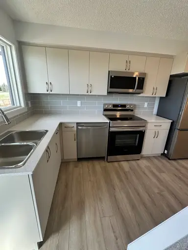 Photo of (PN1128) Stylish 2 Bedroom Townhome with Single Car Garage Property Image