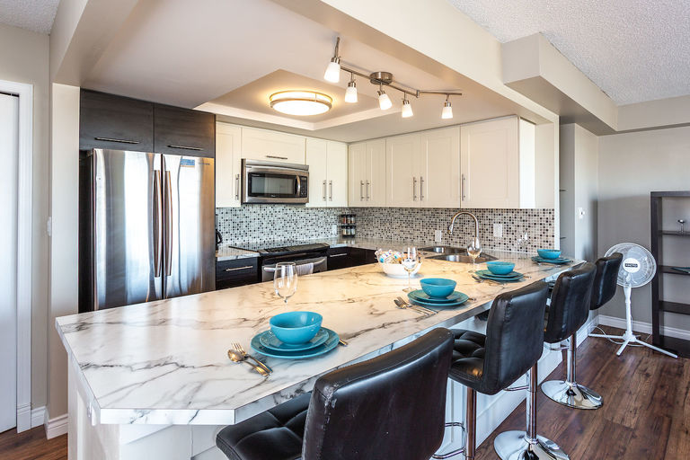 Photo of Fully Furnished Modern Condo- cable/internet, A/C, parking, utilities Included! Property Image