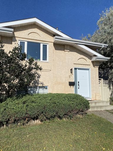 Photo of 3BR/1.5BA bi-level single home with detached double garage Property Image