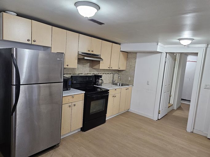 Photo of 2 Bedrooms + Living+ 2 Car parking+ Backyard: lower floor suite in NE-Whitehills Property Image
