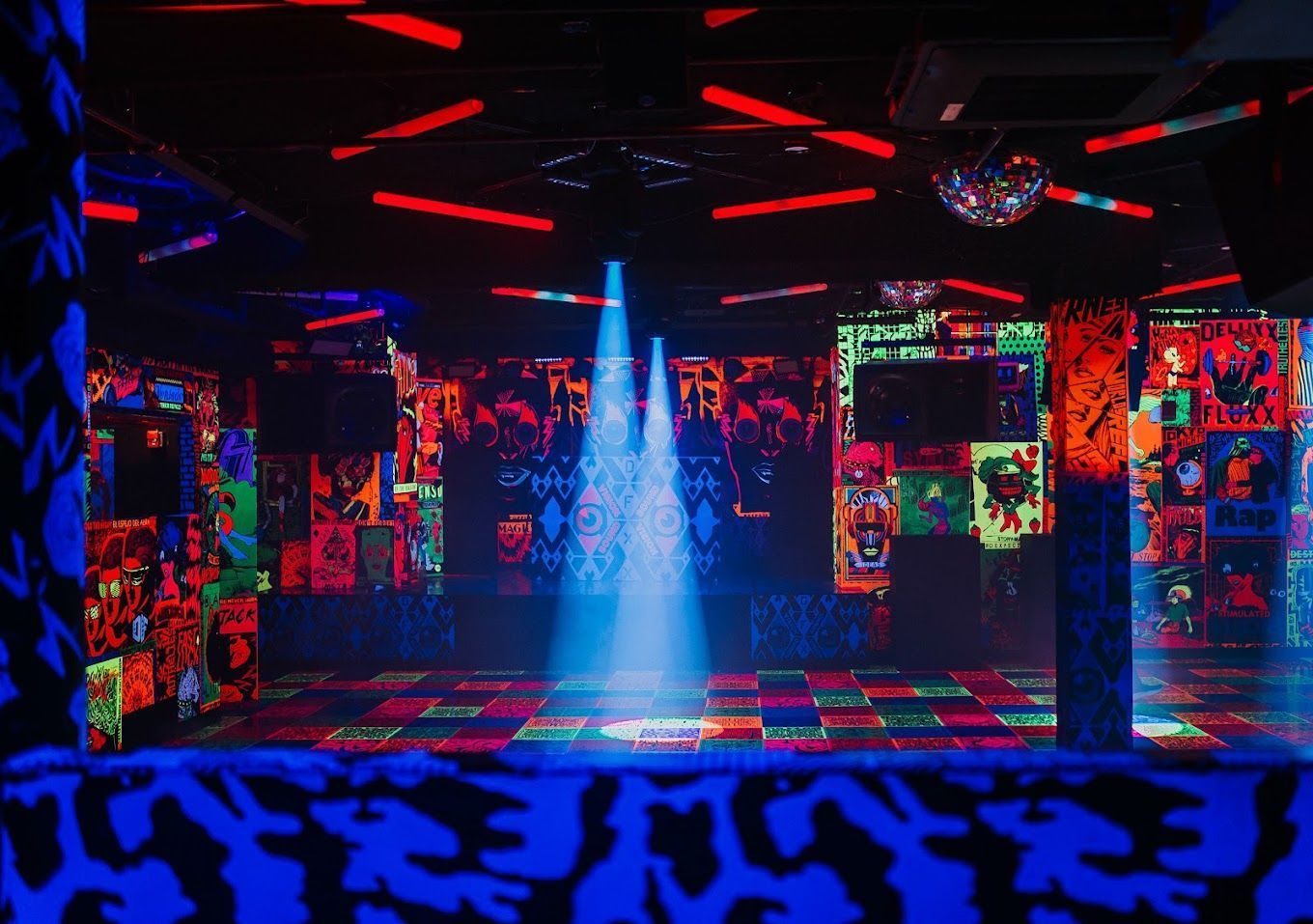 Deluxx Fluxx East Village blacklight room and arcade cabinets for private events