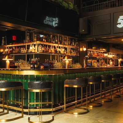 Bi-level bar and lounge interior at 5th&Mad in Midtown Manhattan