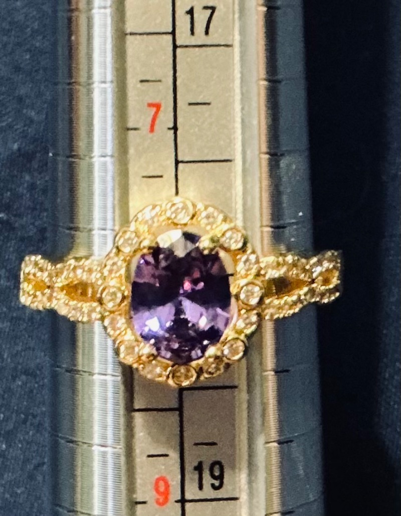Gold Ring with Purple Gemstone and Diamond Halo