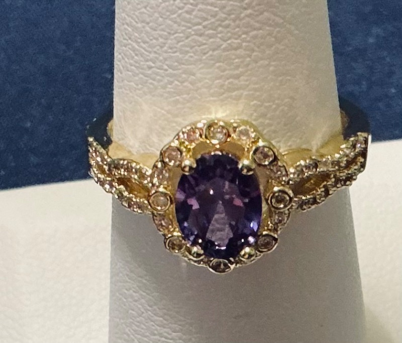 Elegant Gold Plated Ring with Oval Purple CZ Gemstone and Clear Accents