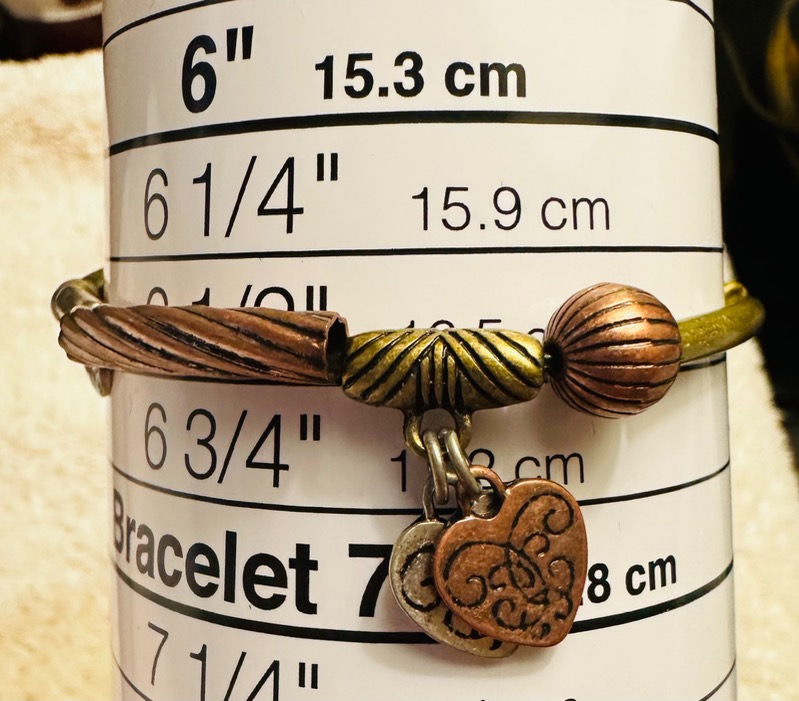 Bronze-Toned Bracelet with Heart-Shaped Charm and Decorative Metal Beads