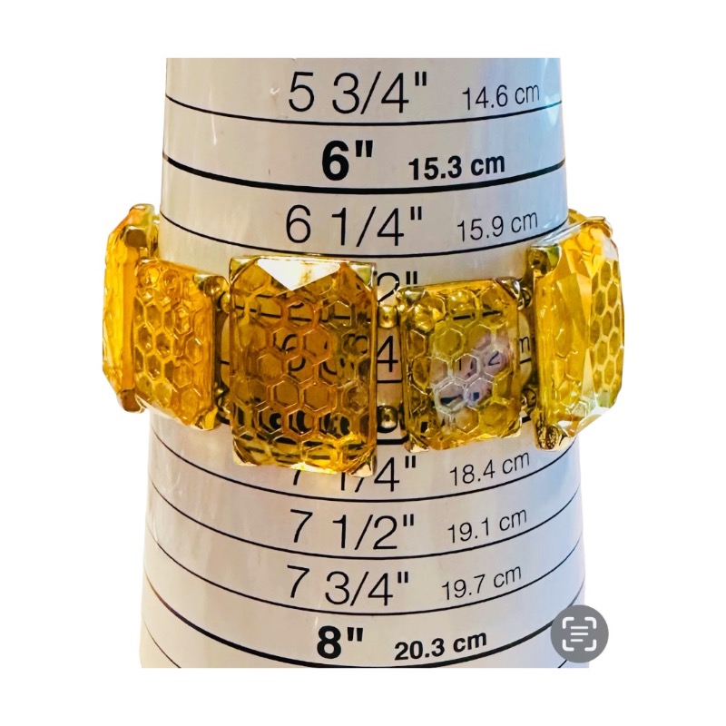 Ornate Gold-Tone and Amber-Hued Bracelet with Honeycomb Pattern