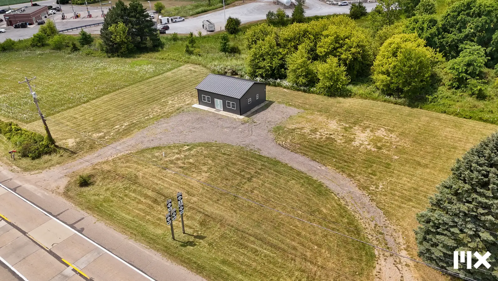 High Visibility Corner | Commercially Zoned Land & Building image 1