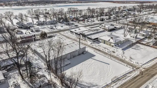 4618 Pointe Tremble Rd | Sunsation Building thumbnail 3