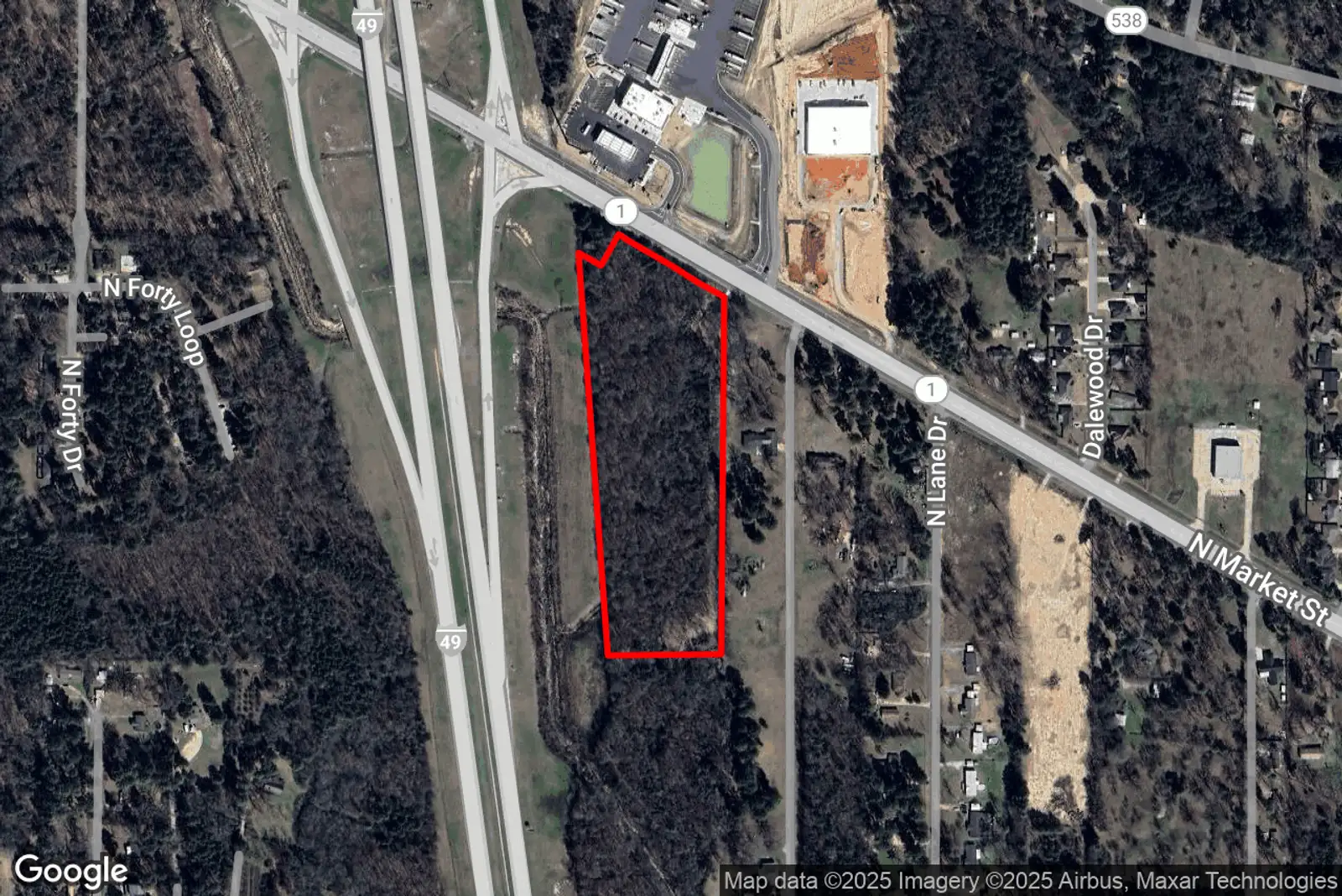 11.453 +/-acres corner Hwy 1 @ I-49