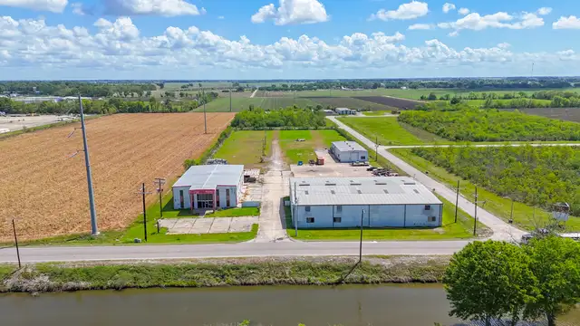 Dual Warehouses Near Hwy 90 with Surplus Land and Office thumbnail 3