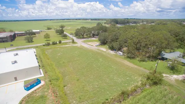 1 acre cleared next to Dollar General thumbnail 4