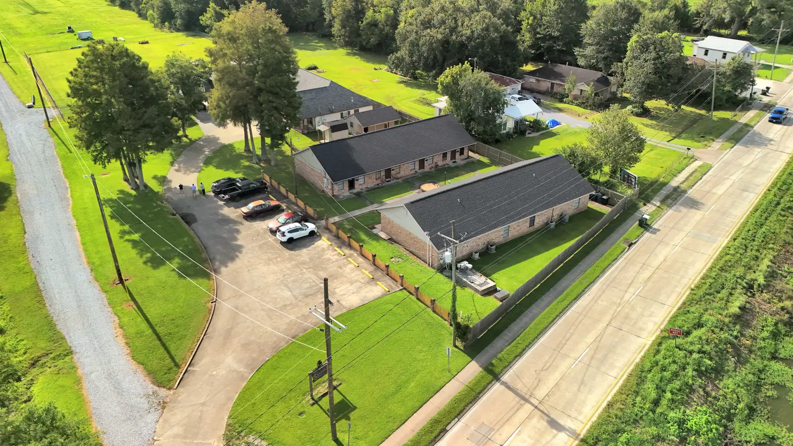 8-Plex, Single Family Residence, Development Land & Cell Tower Income