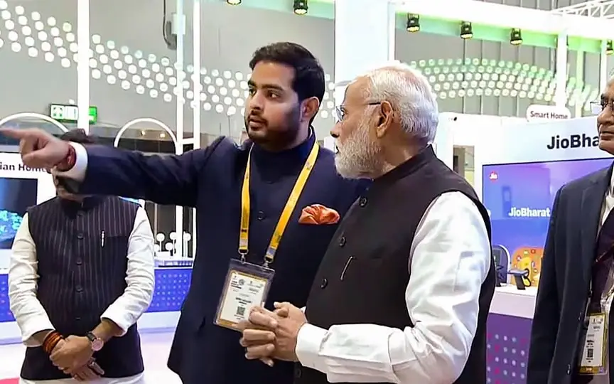 Prime Minister Narendra Modi with Chairman of Reliance Jio Infocomm Limited Akash Ambani at the Jio pavilion at the India Mobile Congress, in New Delhi, Friday, Oct. 27, 2023. (PTI)