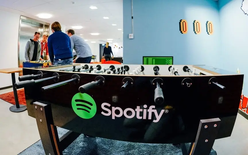 The Spotify logo is pictured on a football table placed in a playroom at the company headquarters in Stockholm on February 16, 2015. (AFP)