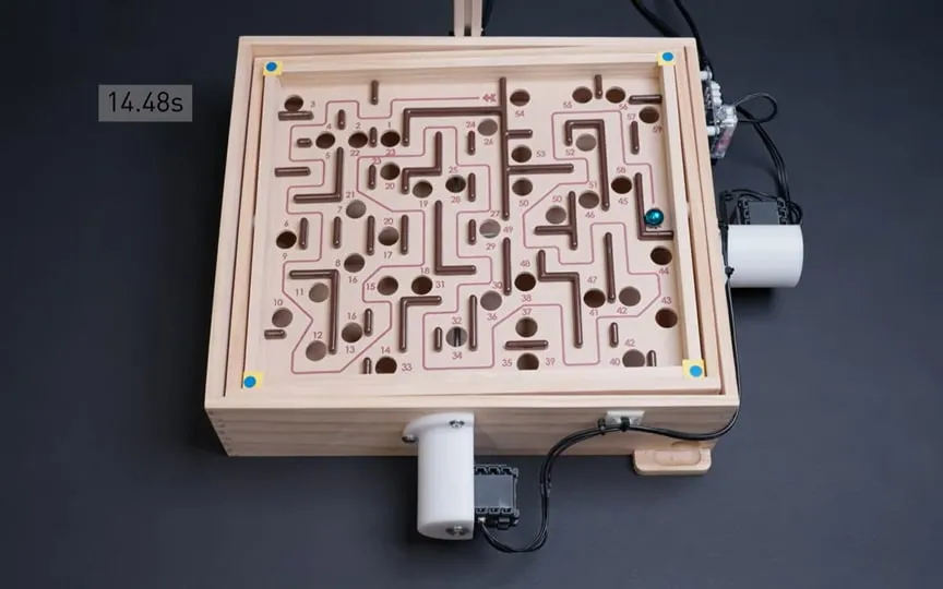 Meet CyberRunner, the robot from ETH Zurich, which mastered a physical maze game to beat humans, and pave the way for accessible AI research. (Thomas Bi/ YouTube)