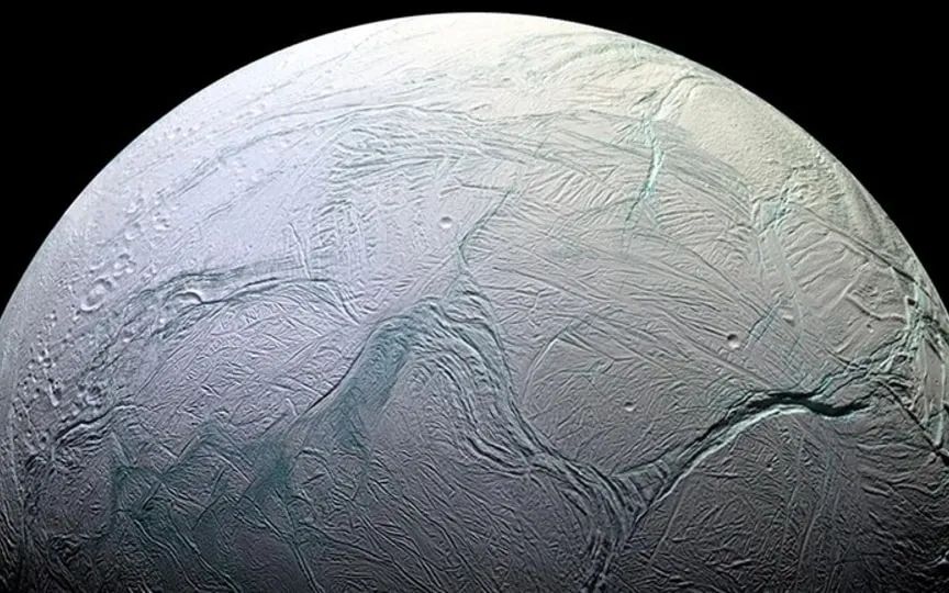 Caption: Saturn's moon Enceladus: A testament to cosmic forces shaping a tiny world. (NASA)
