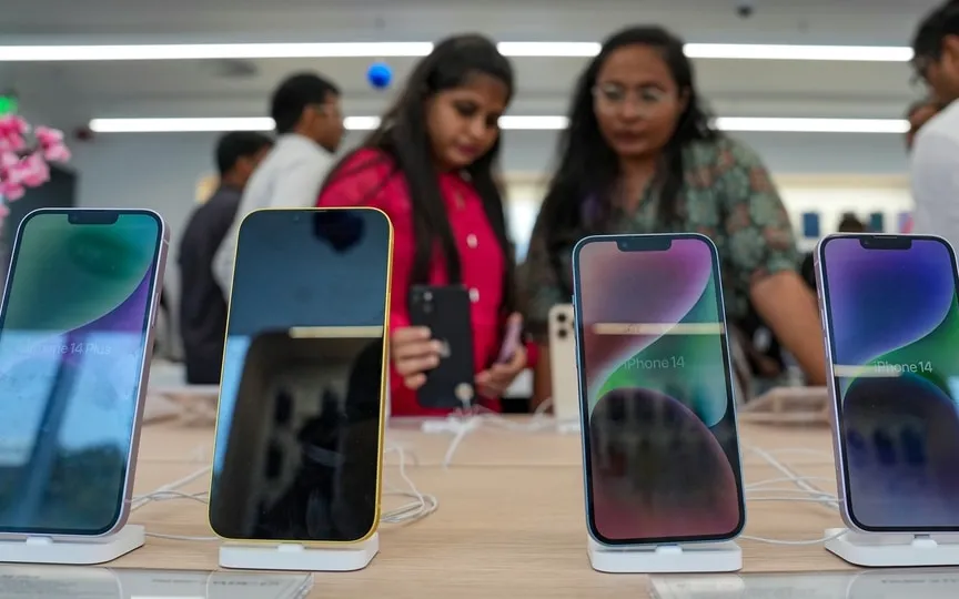 Customers at the newly inaugurated Imagine store, a leading retailer of Apple products, in Bengaluru, (PTI)