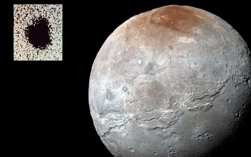 Pluto's largest moon Charon's size is about one-tenth that of planet Earth. (NASA, Johns Hopkins Univ./APL, Southwest Research Institute, U.S. Naval Observatory)