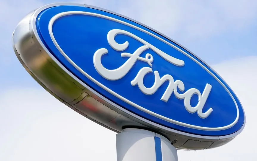 Ford hires a former Apple employee to run its new unit for software subscription services. (AP)