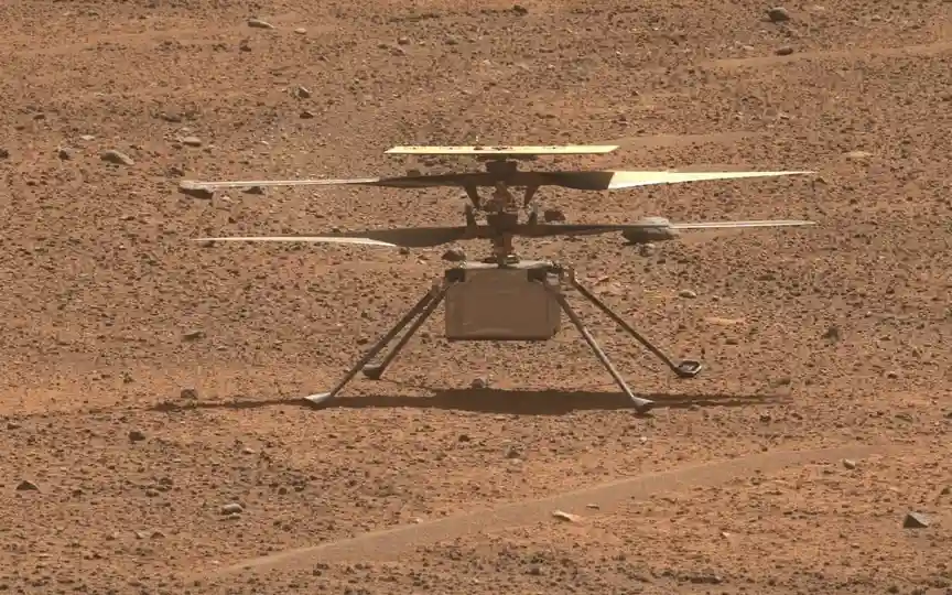 NASA's Ingenuity helicopter soars over the Martian surface in historic flight and landing. (NASA/JPL-Caltech/ASU/MSSS)