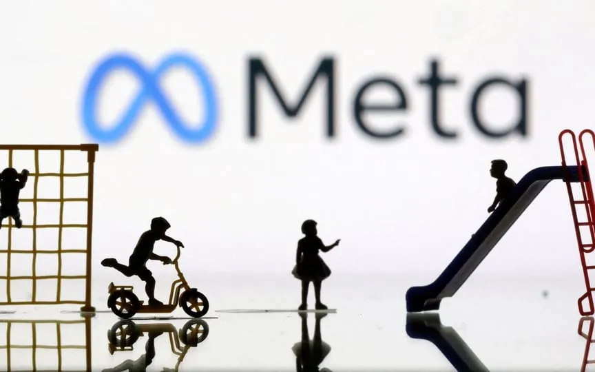 Children playground miniatures are seen in front of displayed Meta logo in this illustration taken April 4, 2023. (REUTERS)