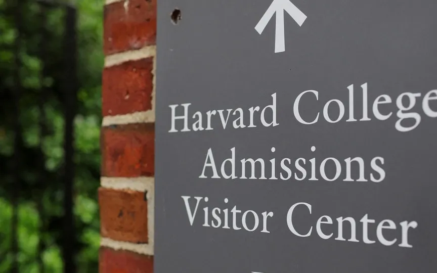 A sign points the way to the Harvard College Admissions Visitors Center at Harvard University in Cambridge, Massachusetts, U.S., July 6, 2023. (REUTERS)