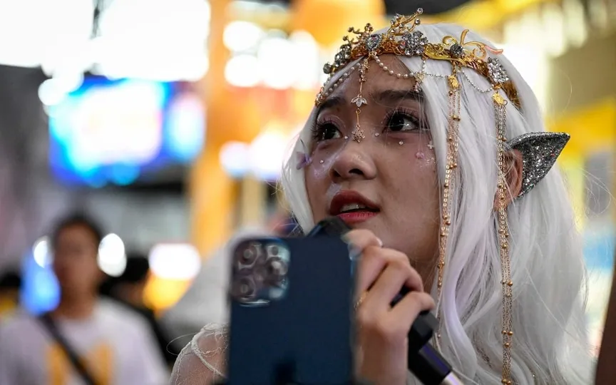 A cosplayer is seen at the China Digital Entertainment Expo & Conference, known as ChinaJoy, which has been held for 20 years, in Shanghai on July 28, 2023. (AFP)