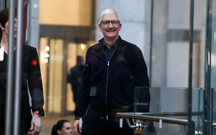 Apple CEO Tim Cook walks at the Apple Fifth Avenue store as customers queue to buy Apple's Vision Pro headset, in Manhattan in New York City, U.S., February 2, 2024. (REUTERS)