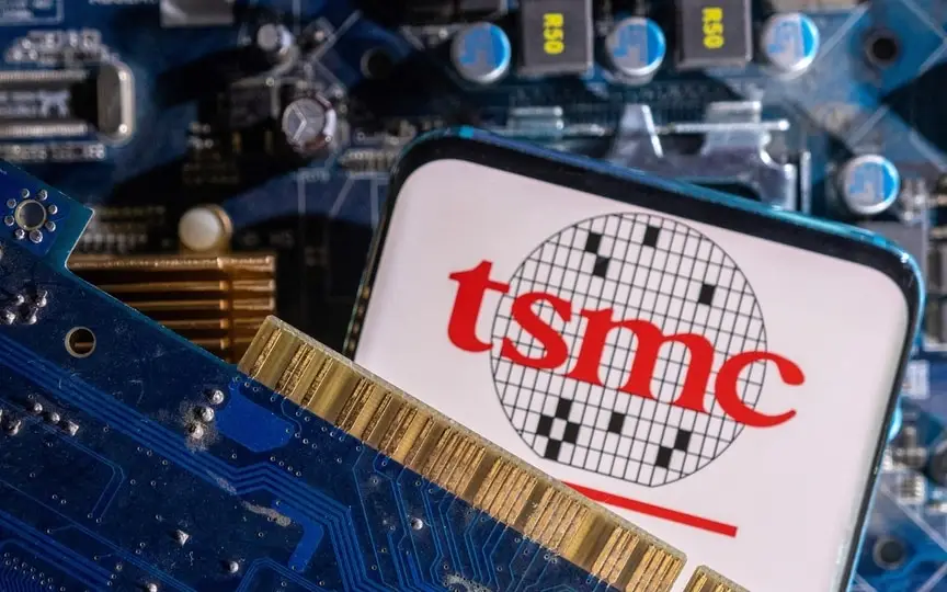 A smartphone with a displayed TSMC (Taiwan Semiconductor Manufacturing Company) logo is placed on a computer motherboard in this illustration taken March 6, 2023. (REUTERS)
