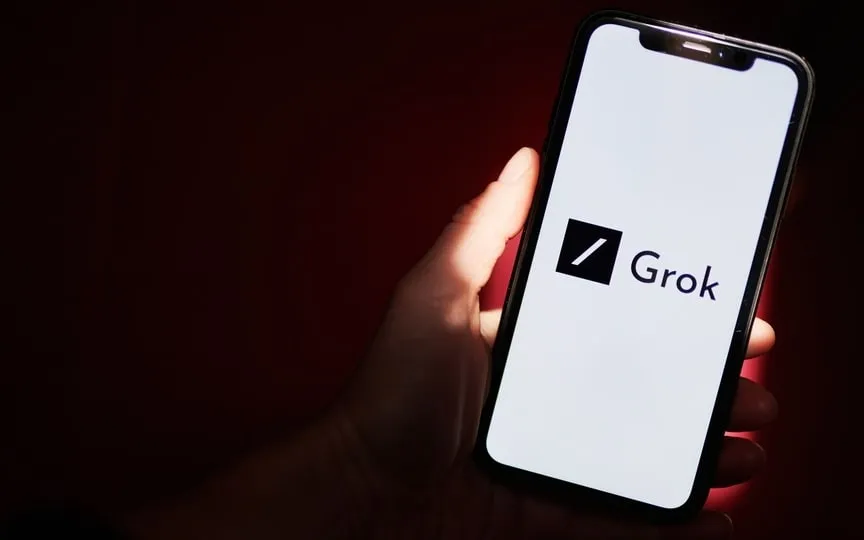 X introduces Grok chatbot to Premium subscribers, expanding access to interactive features. (Bloomberg)