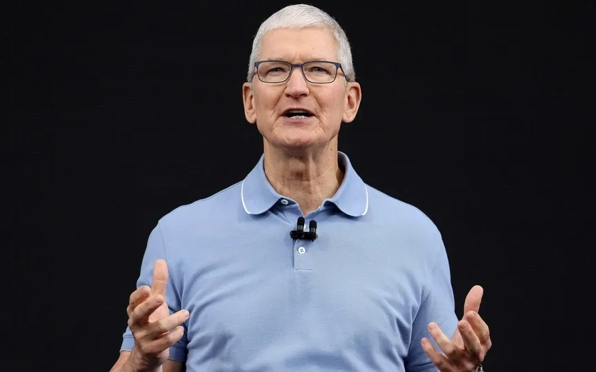 India's growing developer community attracts global tech giants like Apple, with CEO Tim Cook praising the ecosystem's growth and double-digit revenue in India. (Getty Images via AFP)