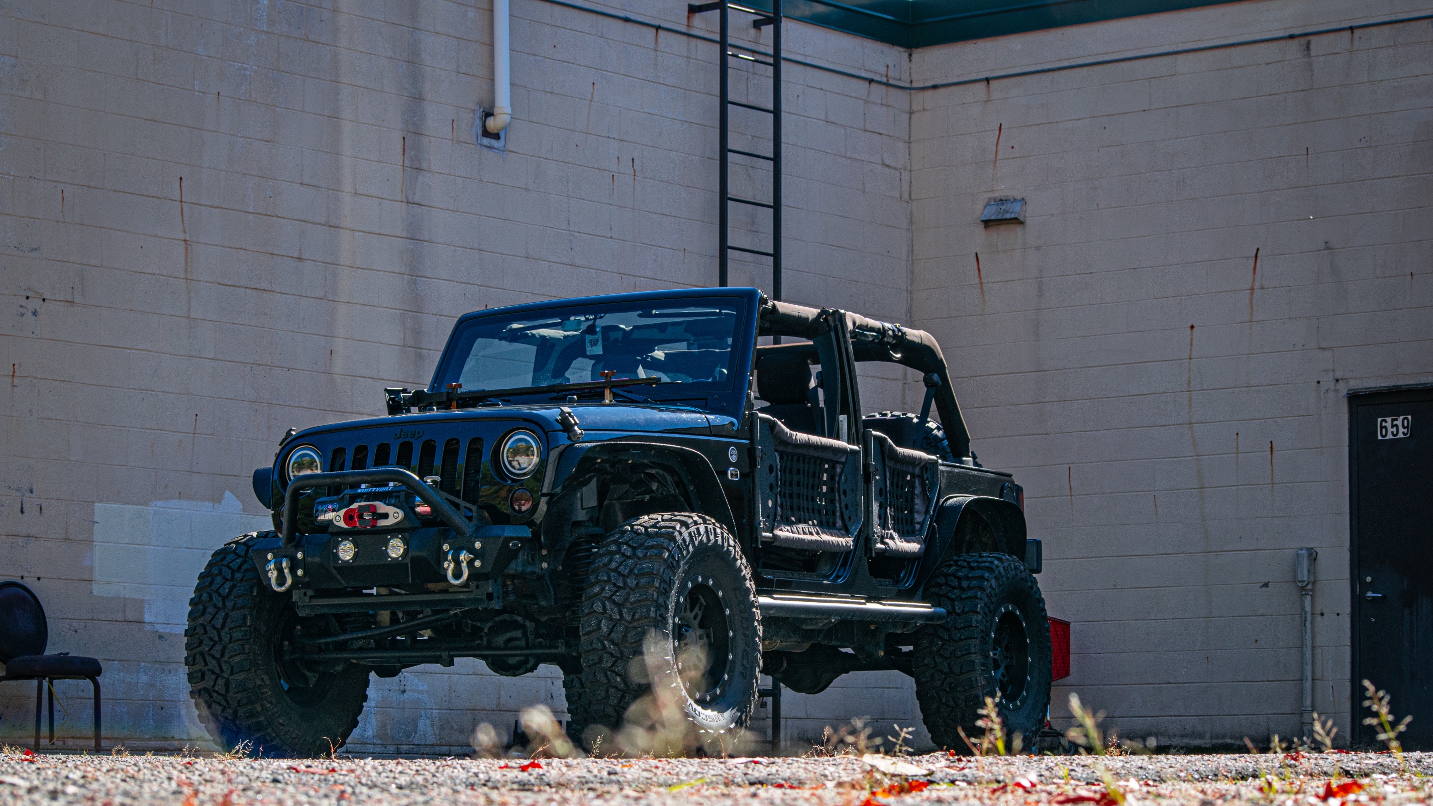 2013 Jeep Wrangler JKU - big black Jeep | REVKIT