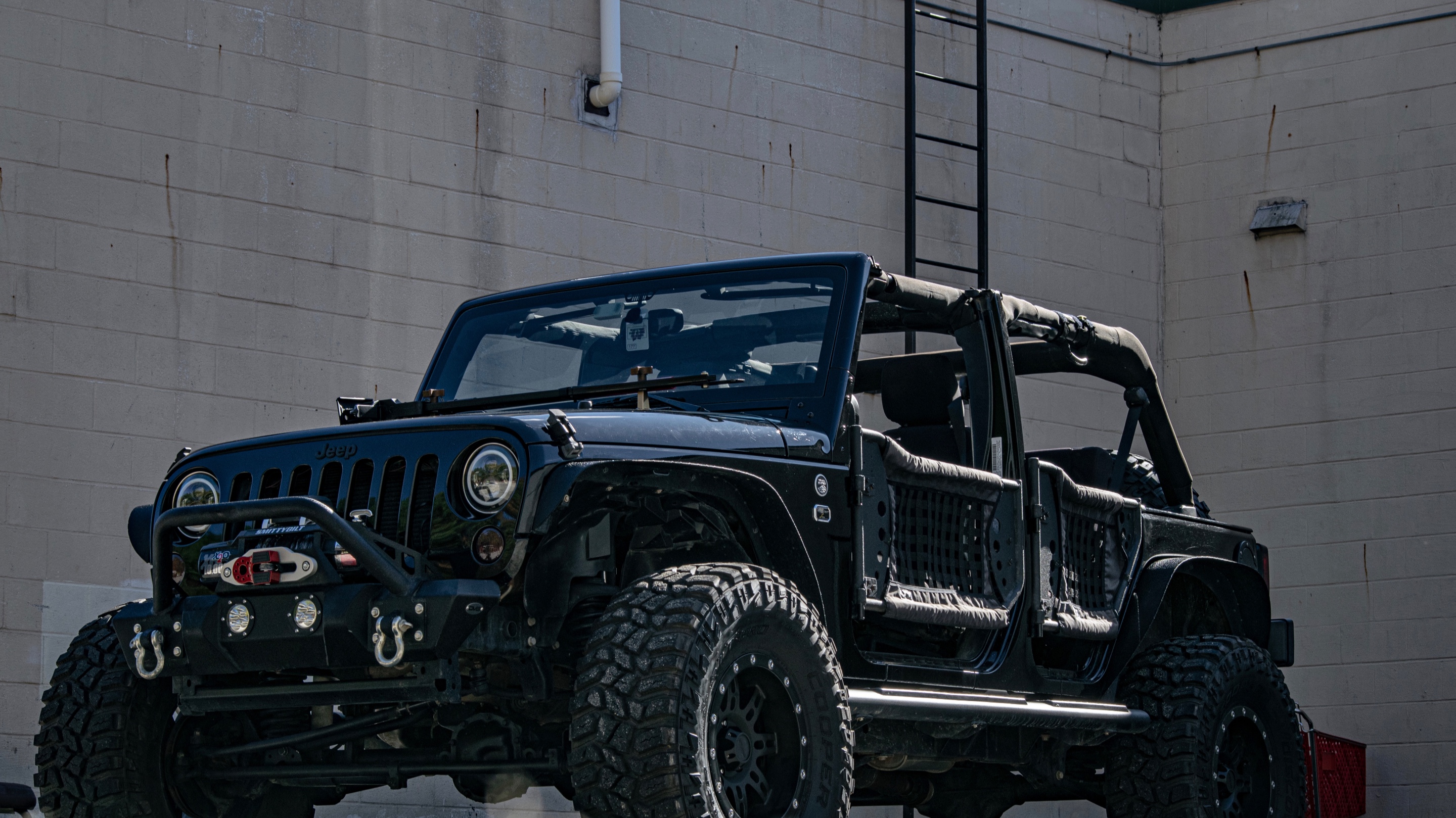 2013 Jeep Wrangler JKU - big black Jeep | REVKIT