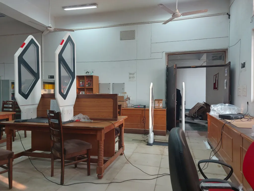 Dual pedestal RFID and AM EAS anti-theft security gate deployed in commercial showroom entrance