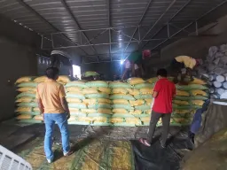 RFID inventory tracking system scanning bulk fertilizer bags in warehouse rack aisle India