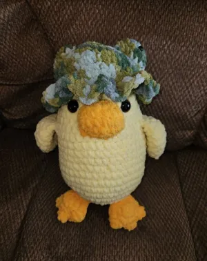 Duckie with a frog hat