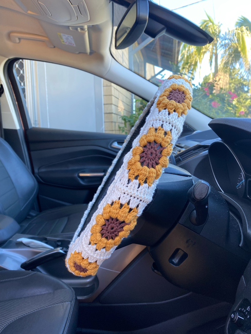 I made a sunflower steering wheel cover! : r/crochet