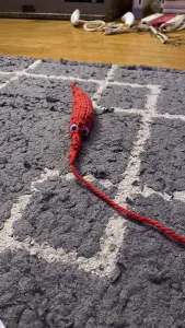 Worm on a string