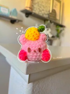 Kirby Holding a Fruit