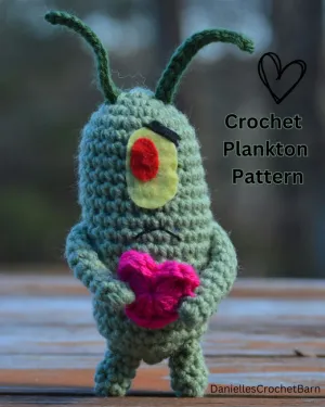 Crochet Sad Plankton holding a heart