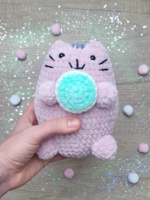 Fat Cat Pusheen. Fluffy Kawaii Kitten with a Macaron.