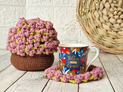 Crochet flower coasters in a pot pattern