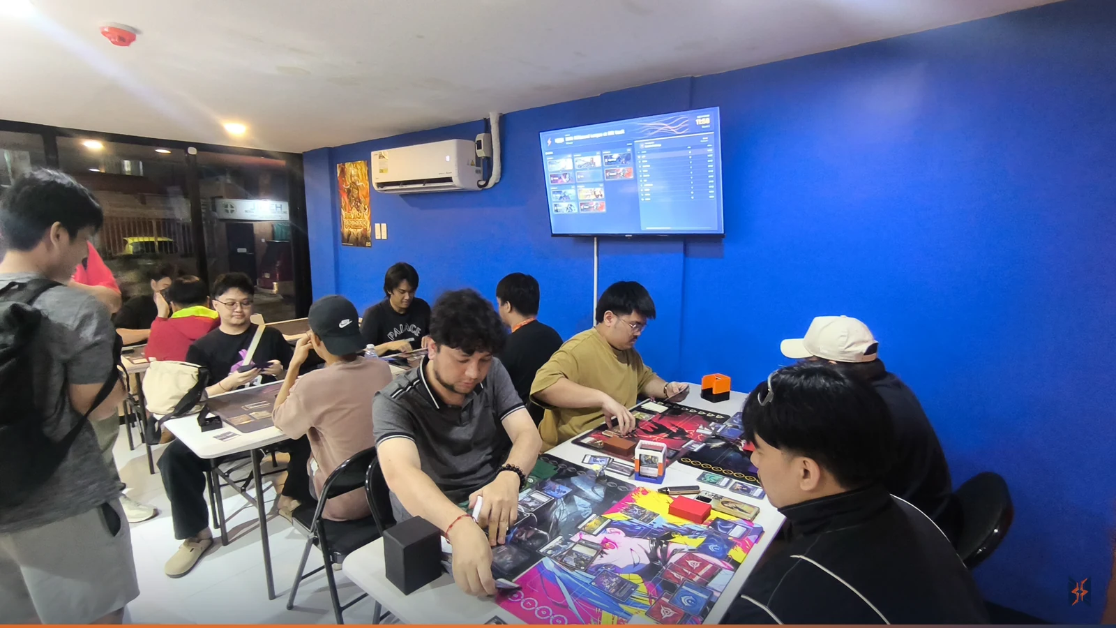 The whole room playing Riftbound during the league Pilot Session