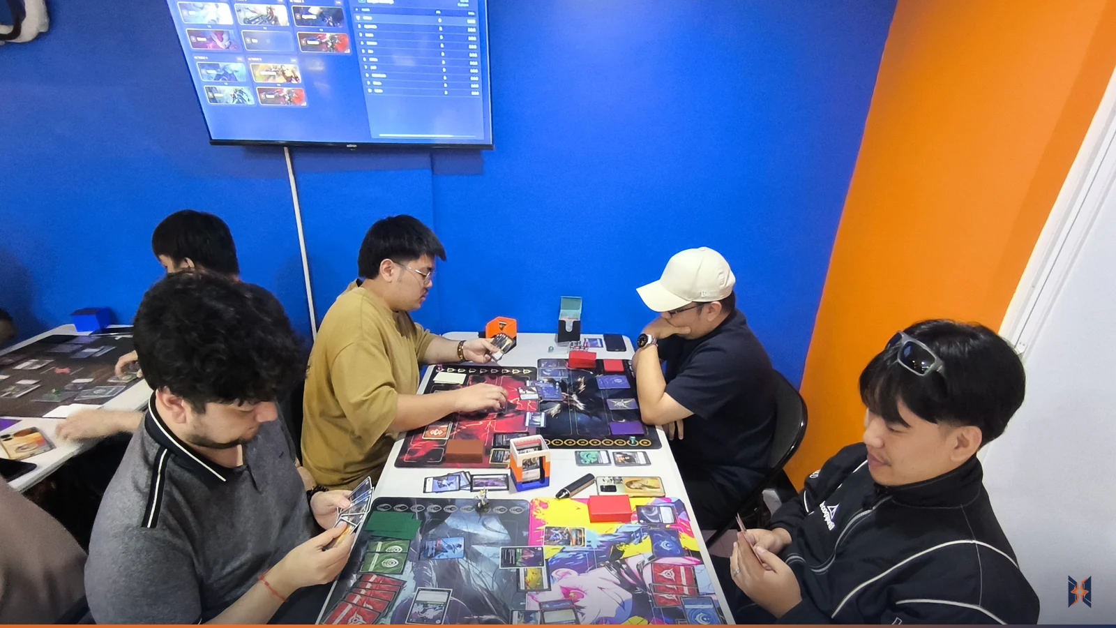 Players at the main table during the Riftbound League Pilot Session