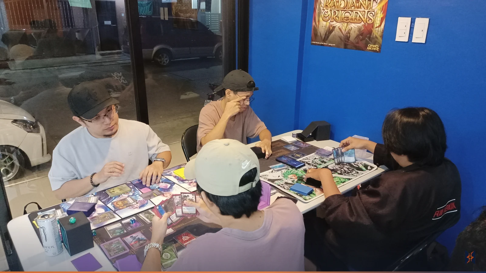 Players focused on a close Riftbound match at Nexus Night