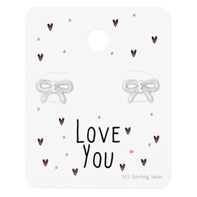 Silver Bow Ear Studs on Love You Card