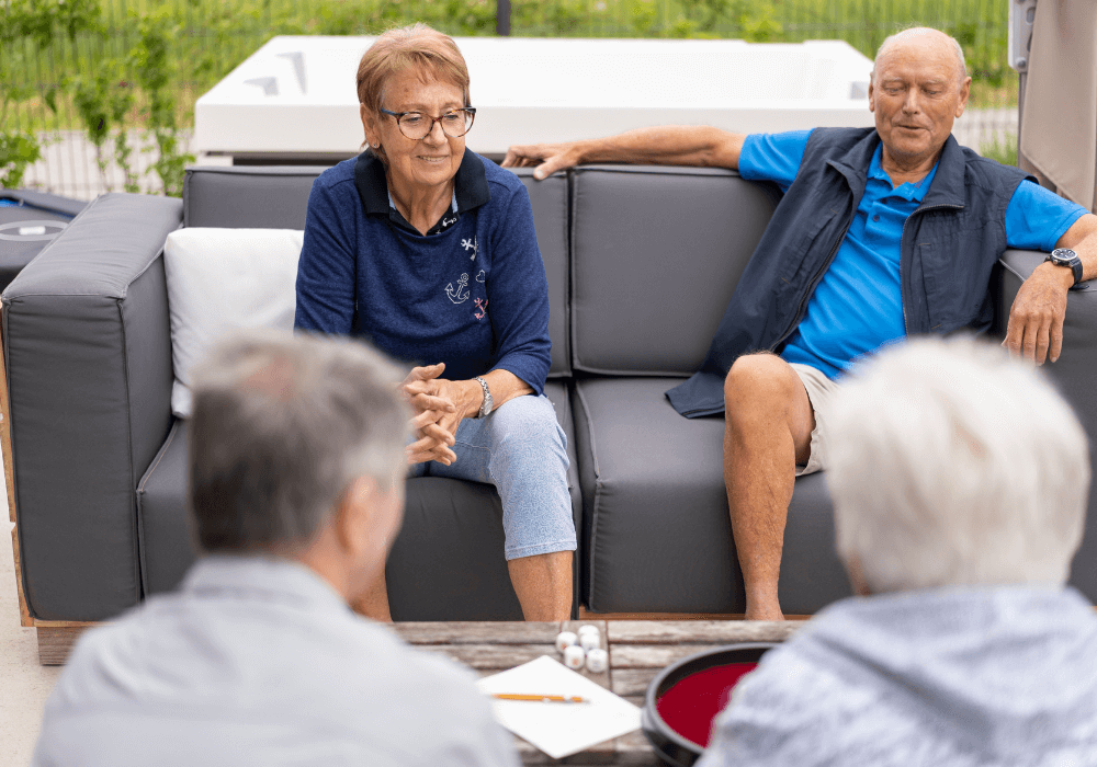 Outdoor Spaces for Seniors 3 Seniors talking at an outdoor space | RIsing Star Properties